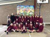 Robertson Public School has collaborated with ReFrame and Community Links Wellbeing to create a mural that represents resilience and recovery. Picture by Briannah Devlin