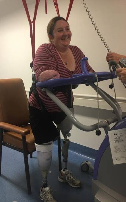 STANDING TALL: Korina is getting the hang of her new prosthetic legs. Picture: Supplied.