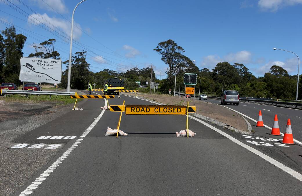 The barriers on Bulli Pass will be removed on Friday and the road reopened from 3pm and it will stay open all weekend. Picture: Robert Peet