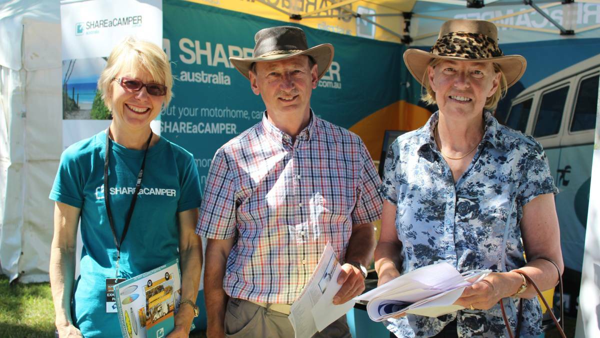 Angela Sumners from Share-a-camper, the 'airbnb of caravans and campers', with tourists Hubert and Jacqueline Oversteegan from The Netherlands at last year's Outdoor Recreation and Adventure Show. Photo: Claire Fenwicke. 