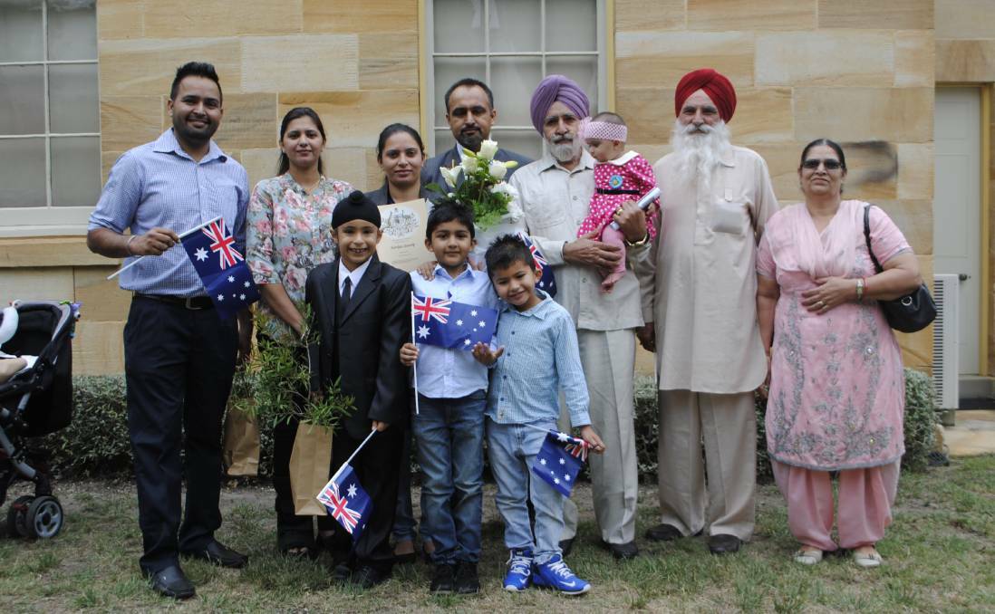 AUSTRALIAN: New Australian citizens Manjit Singh Brar, Gurjeet Kaur Grewal and their son Ranbir Singh Brar with their extended family on Australia Day 2017. Photo: SHN File. 