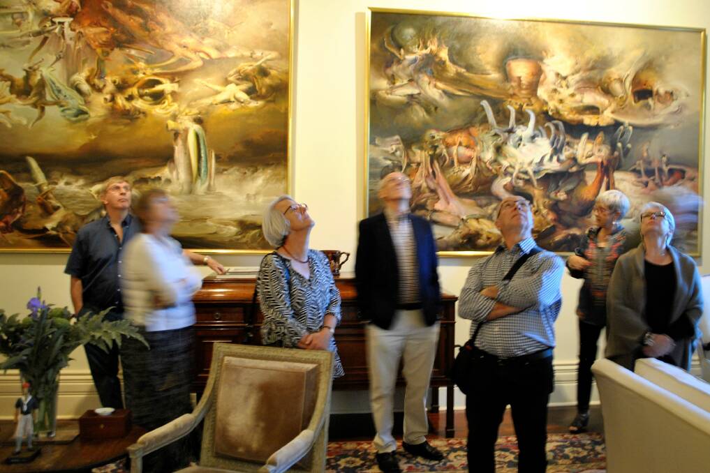 Guests admire the artwork in the morning room of the house at Retford Park. Photo: Charli Shield. 