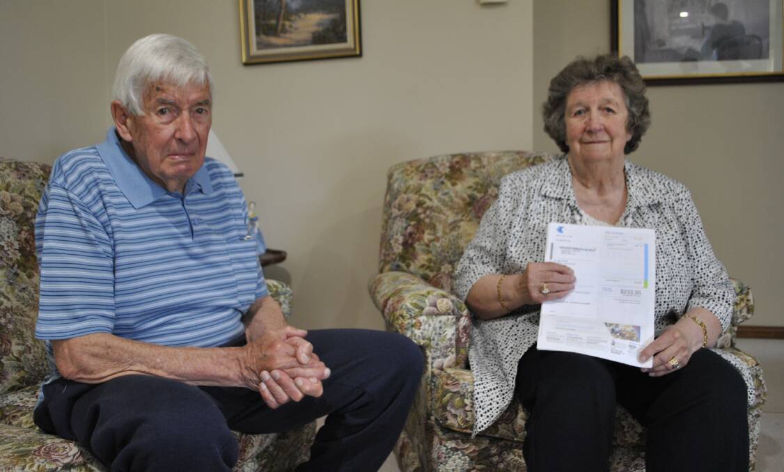 Bob and Beverley Crawford have been through eight faulty phones and modems in the past five months. Photo: Charli Shield. 