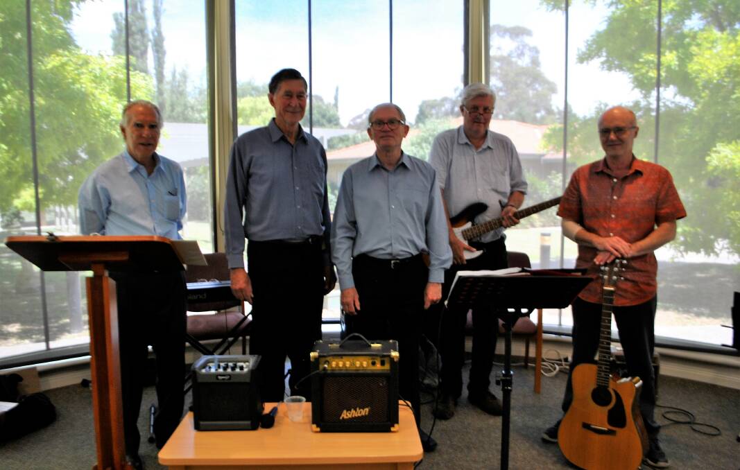 Coney Hatch band members getting ready for their show at Harbison Care Moss Vale - Bill Lovett, Rod Fisher, John Holton, Andrew Wright and Charles Davis. 