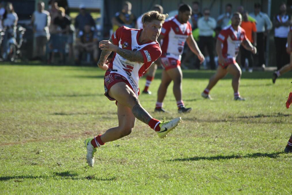 LIGHT EM UP: Dragons squads faced off against Cambelltown City over the weekend. 