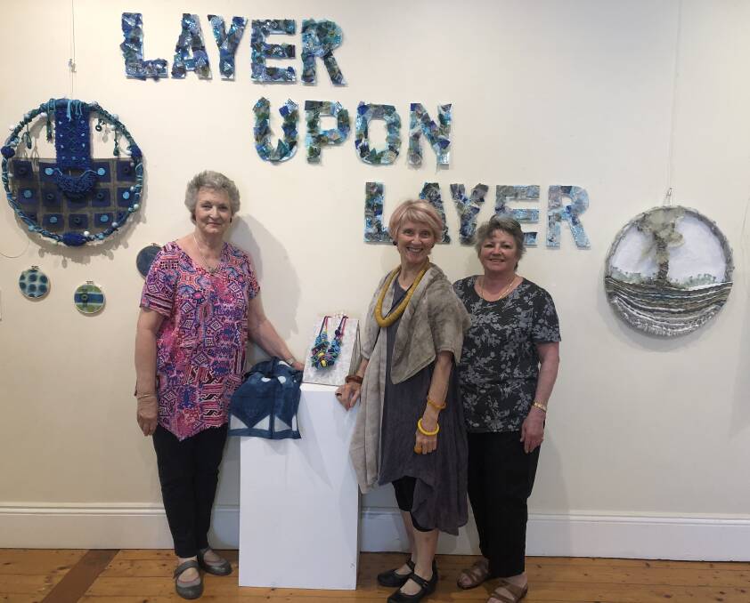 Jenny Coleman, Carol Bairnsfather and Brigitte Haydon preparing for a big weekend at the Southern Highlands Textile & Fibre Exhibition.