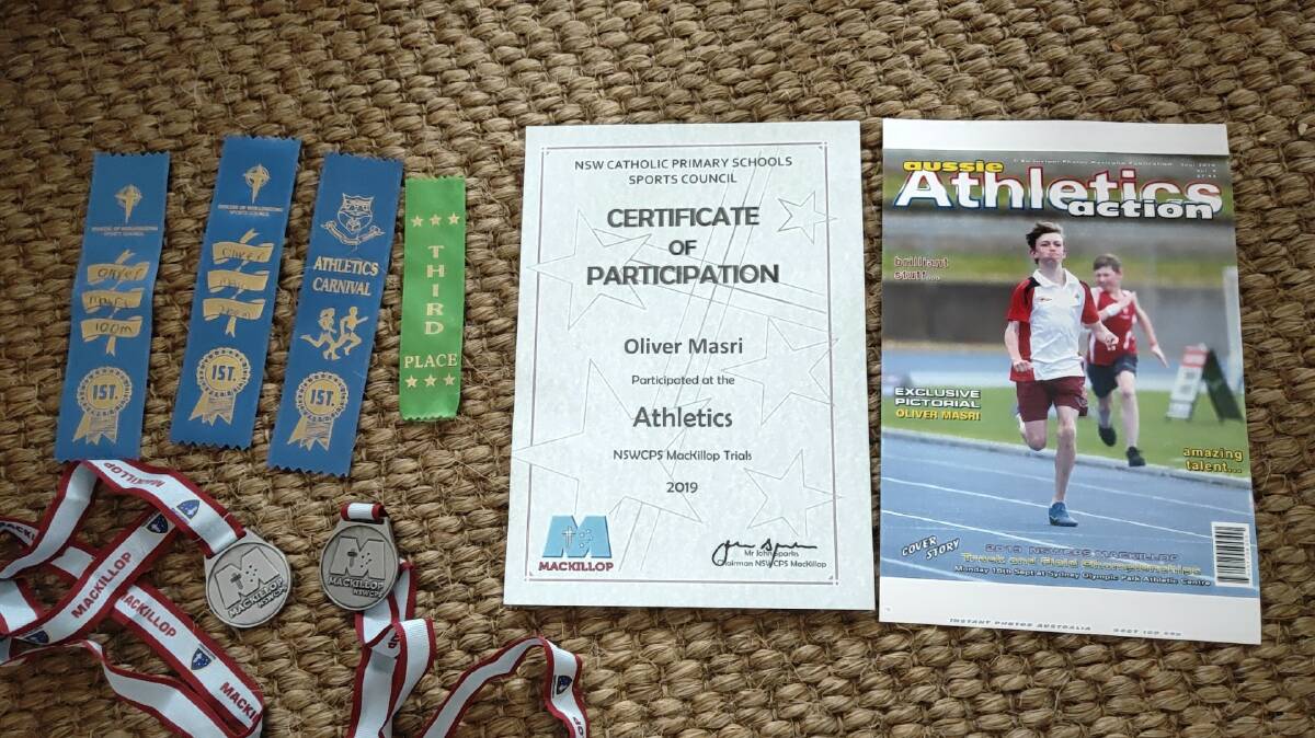  Oliver Masri's quickly growing trophies. He's even been on the cover of Athletics action. 