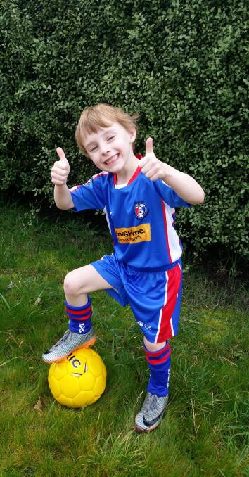 THUMBS UP LITTLE LEGEND: Eric is super excited to start playing soccer this year. 