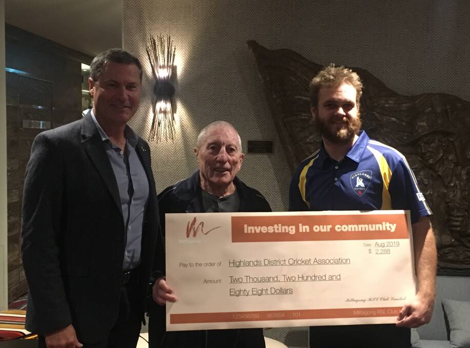 INVESTING IN THE FUTURE: Mittagong RSL's Vice President Roger Cole presenting Simon Taufel and Jack Whitfield with a cheque to help out future Highlands cricketers. 