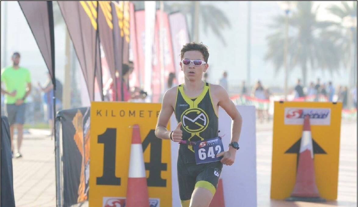Thomas Jennings powering through the running leg, whilst competing in Mamzar, Dubai. Photo supplied.