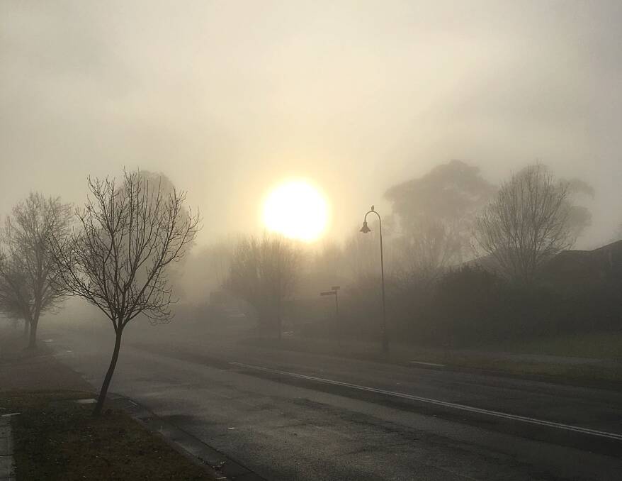Morning stunner: The sunrise on a foggy morning is providing some eye catching material for budding photographers. Photo: Alison Wren