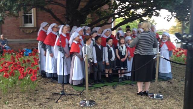The RSL Commentative Rural Choir performs at the Rivendell Flower Show to raise funds for Concord Hospital.
