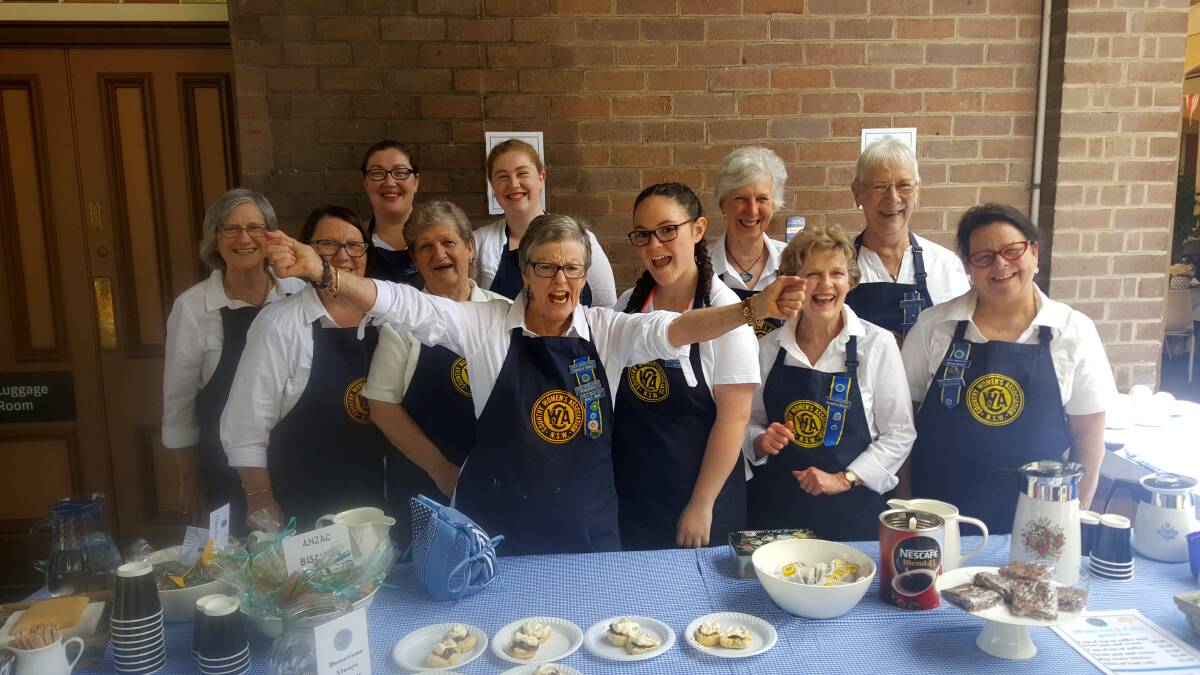 Moss Vale CWA branch members embraced the chance to serve Devonshire teas at the recent Moss Vale train station sesquicentenary celebrations. Photo: supplied