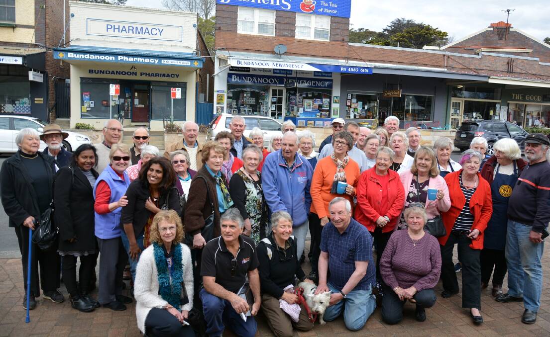 Plenty of Bundanoon locals turned up to watch the unveiling of the newly restored Bushells sign and share some memories over a cup of tea. Photo supplied