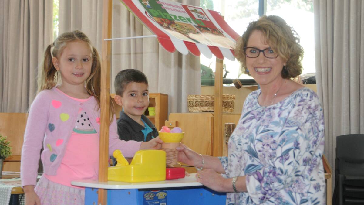 Lucinda and Hugo serve Pauline a delicious gelato at Mittagong Preschool. Pauline said she was grateful for the recognition,
