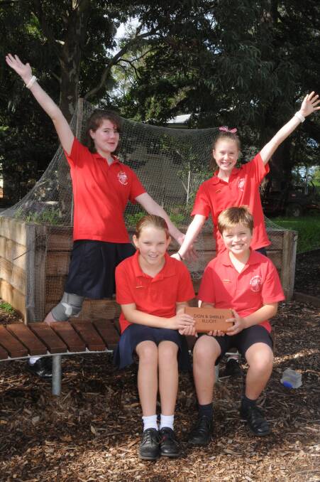 SCHOOL FUNDRAISER: Hilary Swan, Lucy Nash, Molly Mander and Angus De Nooy can't wait for the pavers to arrive. Photo: Lauren Strode