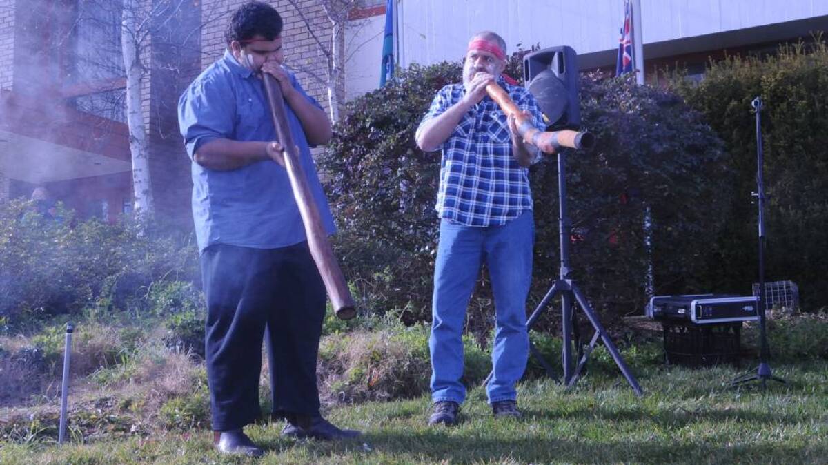 CELEBRATING CULTURE: Patrick Logan and Peter Swain play the Didgeridoo during the opening of NAIDOC Week celebrations in 2016. Photo: Lauren Strode