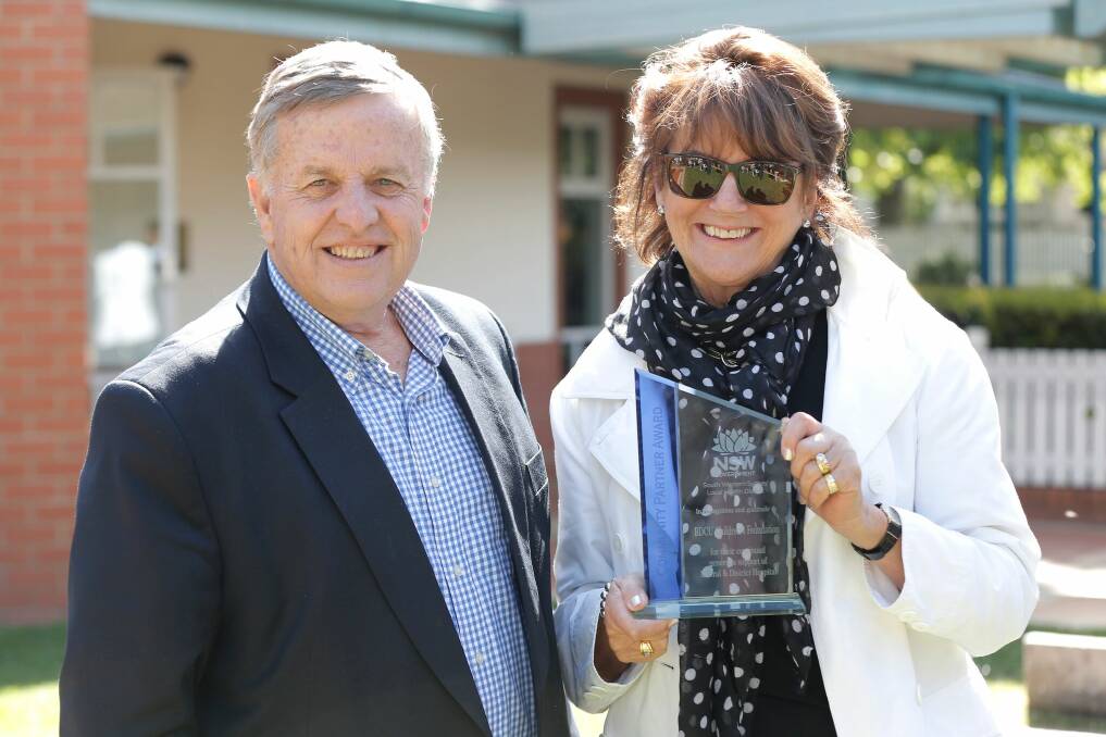 BDCU Childrens Foundation’s Ross Stone (vice president) and Kim Furness (president) with the award. Photo: supplied