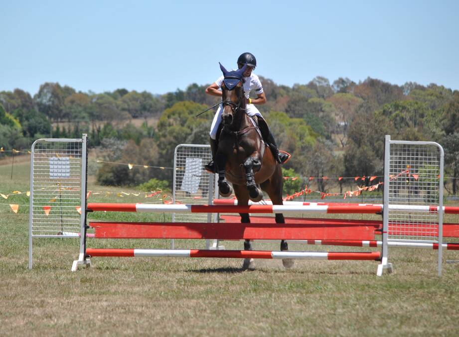 SHOWJUMPING CLASS: Billy Hughes showjumping at the 89th Bowral Show at Bong Bong Racecourse on January 14. Photo: Madeline Crittenden. 