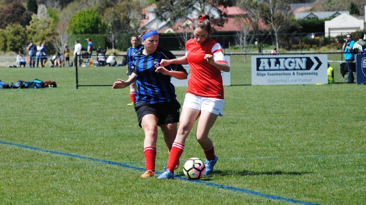 Claire Thompson tackles for Moss Vale White in the women's reserve grade decider against Crookwell. 
