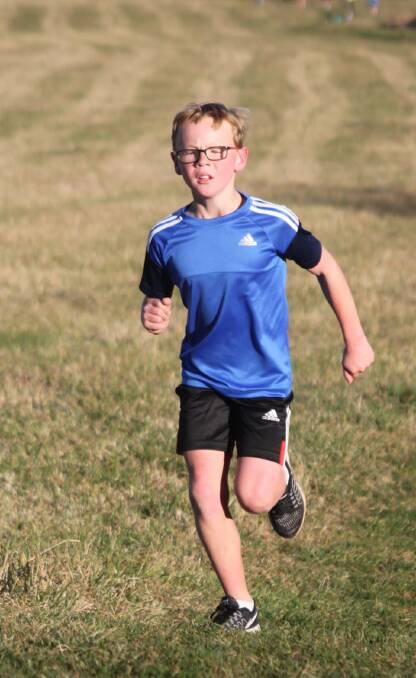 NEW RECORD: 10-year-old Oliver Hampshire set a new record for his age group at the Bowral parkrun on April 8. Photo: supplied. 