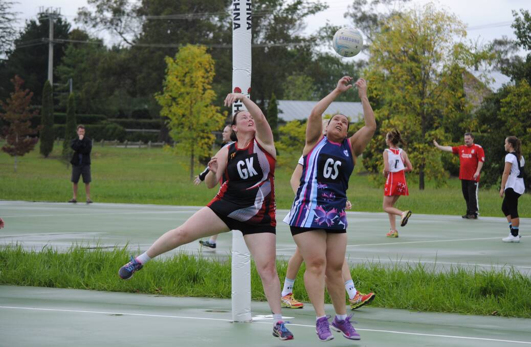 ROUND ONE: The Bowral Butterflies Black faced off against MVD Ladies Red in the opening round of the opens division. Photo: Claire Fenwicke. 