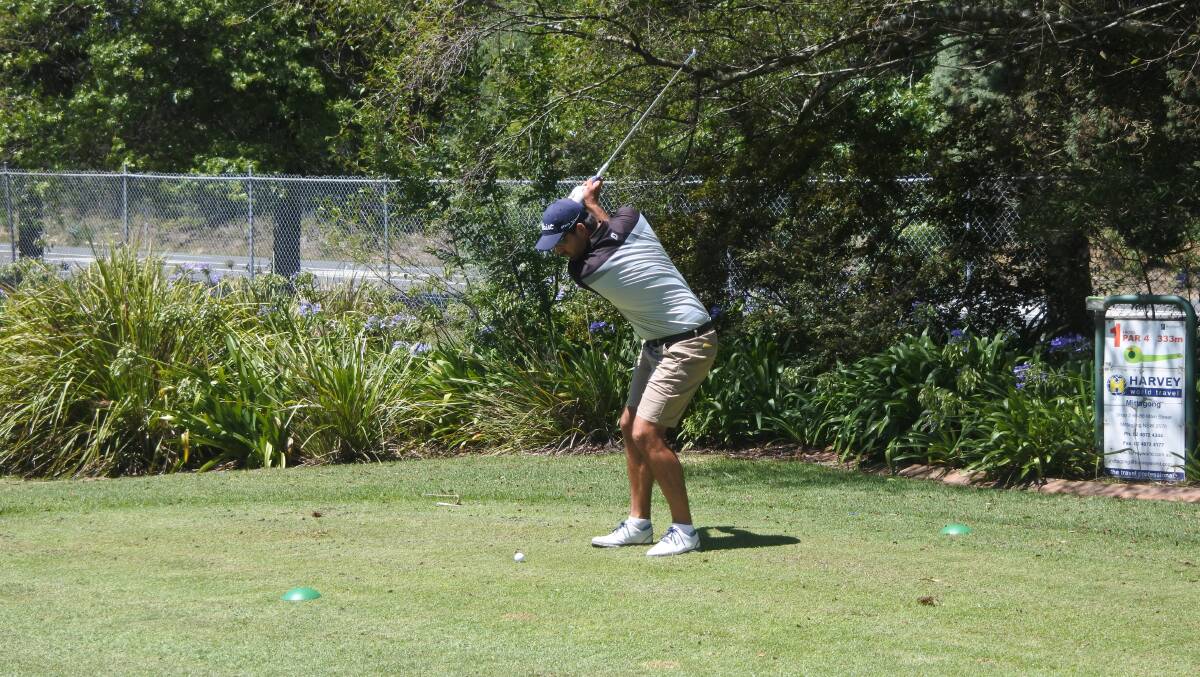 SUMMER GOLF: A golfer taking a swing at the invitational par three pro-am at the Highlands Golf Club on February 10. Photo: Claire Fenwicke. 