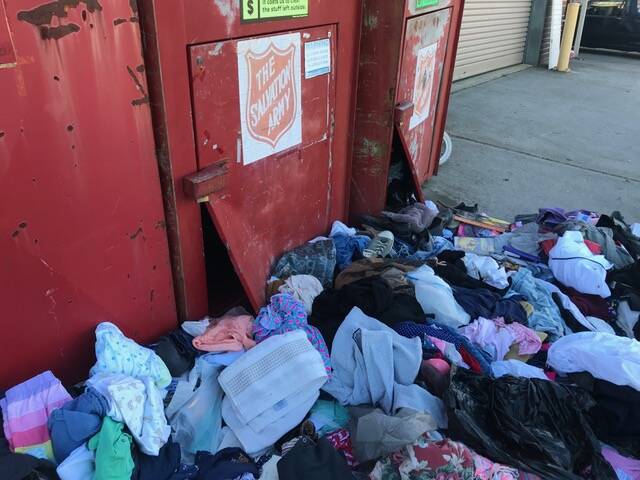 DONATION MESS: The damaged Salvation Army bins on Kirkham Road. Photo: supplied. 