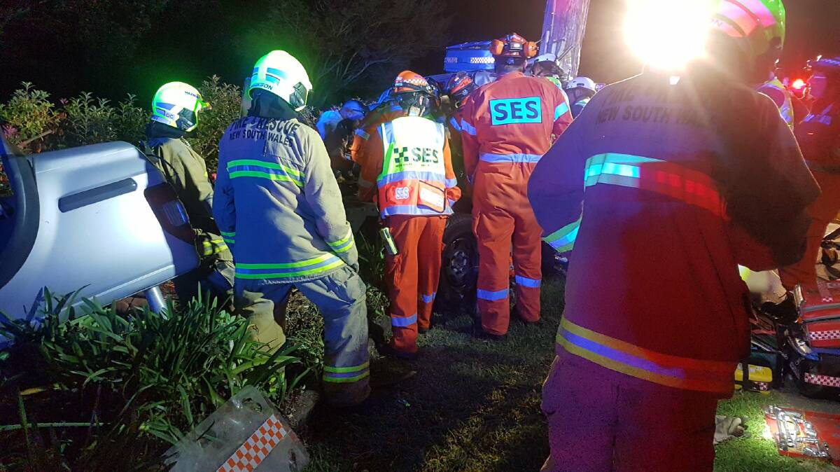 SINGLE VEHICLE CRASH: Emergency services on scene after the crash. Photo: Wingecarribee SES Facebook.  