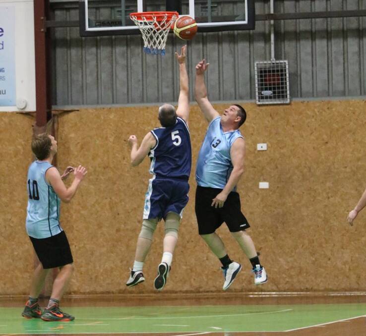 DECIDER: The Mosquitoes defeated the Spherics 90-55 in the men's A grade grand final. Photo: Daniel Bennet. 