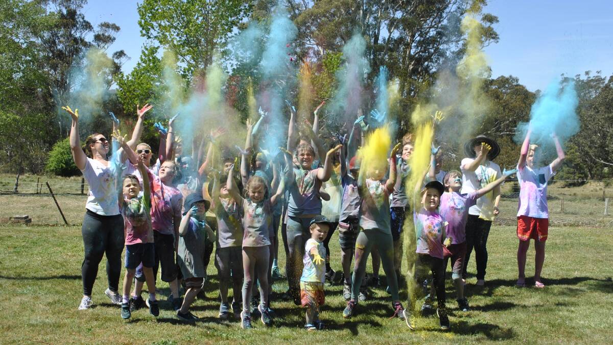 CRAZY COLOURS: Avoca Public School students and teachers at the end of the school's inaugural colour run. Photo: Madeline Crittenden. 