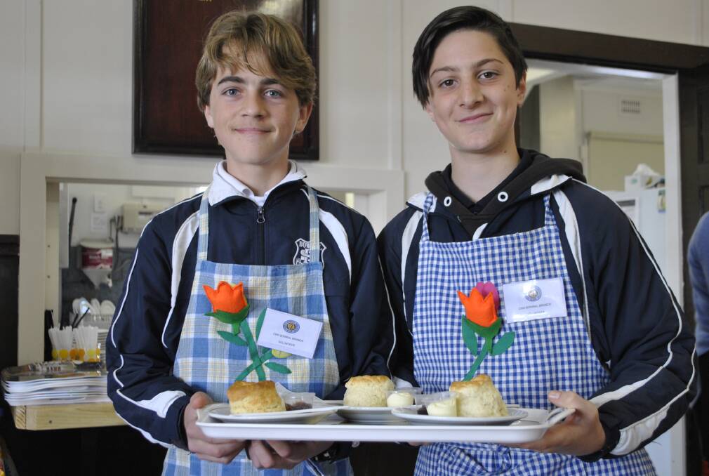 TEA TIME: Year 8 Bowral High students Thomas Hall and Alessio Mauro at the CWA tea rooms. Photo: Madeline Crittenden. 