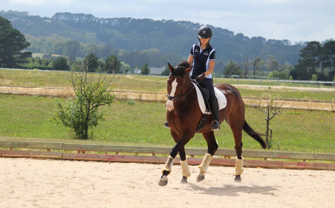 YOUNG RIDERS: Amelia O'Sullivan riding Cooparitz at the Bong Bong Race Course, the home to the Bowral Dressage Club to attend a training day and protocol day.  Photo: supplied. 