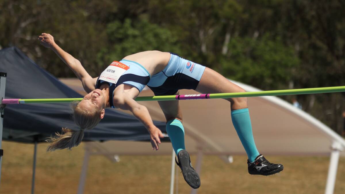 HIGH JUMP: Frensham student Paige Wilson competing in the high jump at the National Championships last year, where she won a national title. Photo: David Tarbotton. 