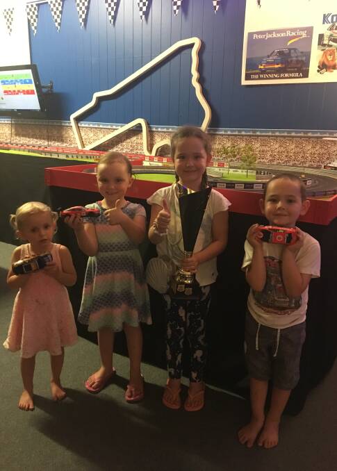 FUN FOR ALL: Lily King, Ruby King, Honour Behr and Justice Behr tested out the slot racing at Race Stars. Photo: Contributed