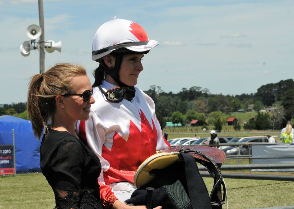 MEMORABLE MOMENT: Trainer Tash Burleigh, with jockey Annelise King, after her first win as a trainer with Reverence at last year's Bong Bong Picnic Races. Photo: Lauren Strode