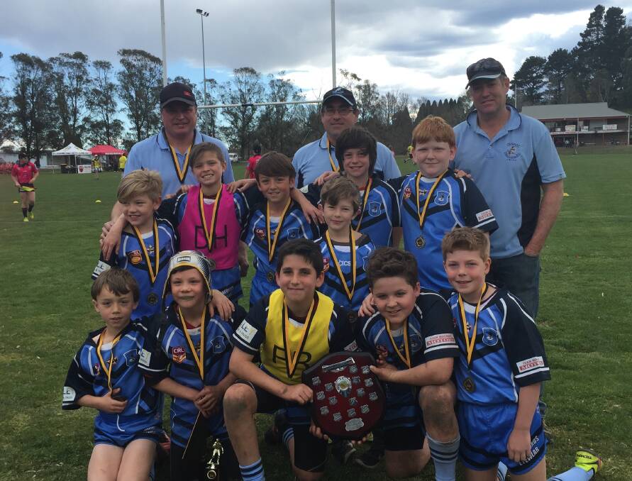 GRINNERS: A fairytale reached its final chapter for the Bowral Kookaburas under 10B team on the weekend with a grand final win. Photo: Contributed