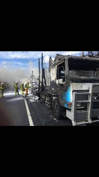 A truck fire has closed all southbound lanes on the Hume Highway at Yerinbool. Photos: Lauren Strode, Peter Fox and Bargo Volunteer Rural Fire Brigade.