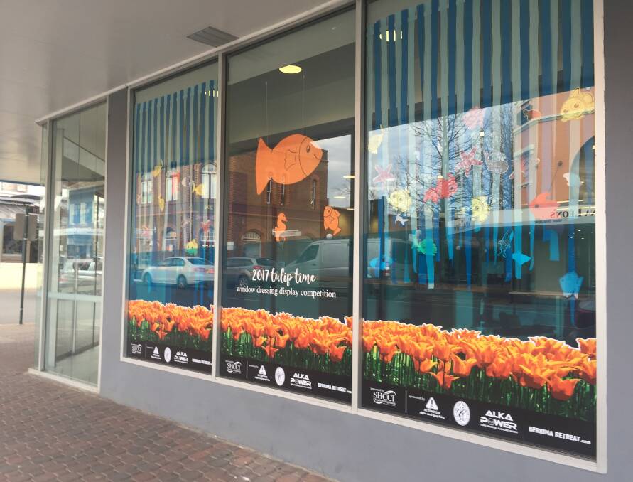 Bowral businesses have embraced Tulip Time with a range of colourful window dressings.