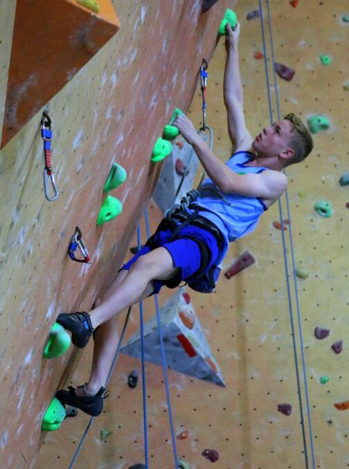 DETERMINATION: Bowral High School student Adam Farrell recently won the NSW/ACT Top Rope Series in the section of 'youth c males'. Photo: Supplied