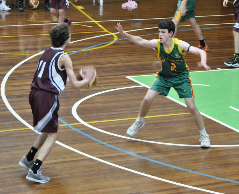 CLOSE COMPETITION: In a good day of basketball at Moss Vale there were games on court all day with both girls and boys at home. Photo: Emily Bennett