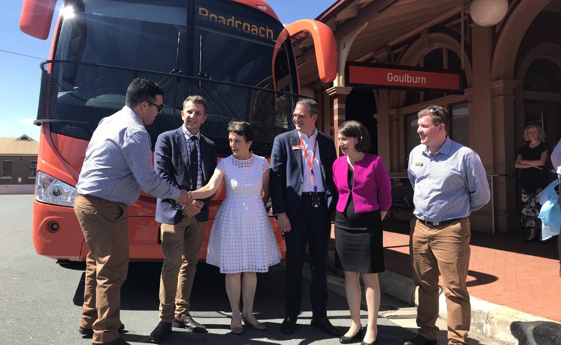 OWNERS:Owners of the road coach that is being contracted to NSW Trainlink Gerard Barklimore and Joe Kmet with  Member for Goulburn Pru Goward, Premier Gladys Berejiklian, Minister for Transport Andrew Constance at the Goulburn Railway Station. Photo David Cole. 