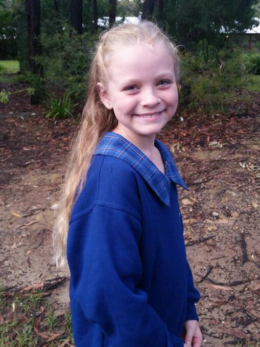 Losing her long locks: Hill Top's Kirsten James (7) will cut her hair and donate it to Ascot Wigmakers for the World's Greatest Shave. Photo: supplied