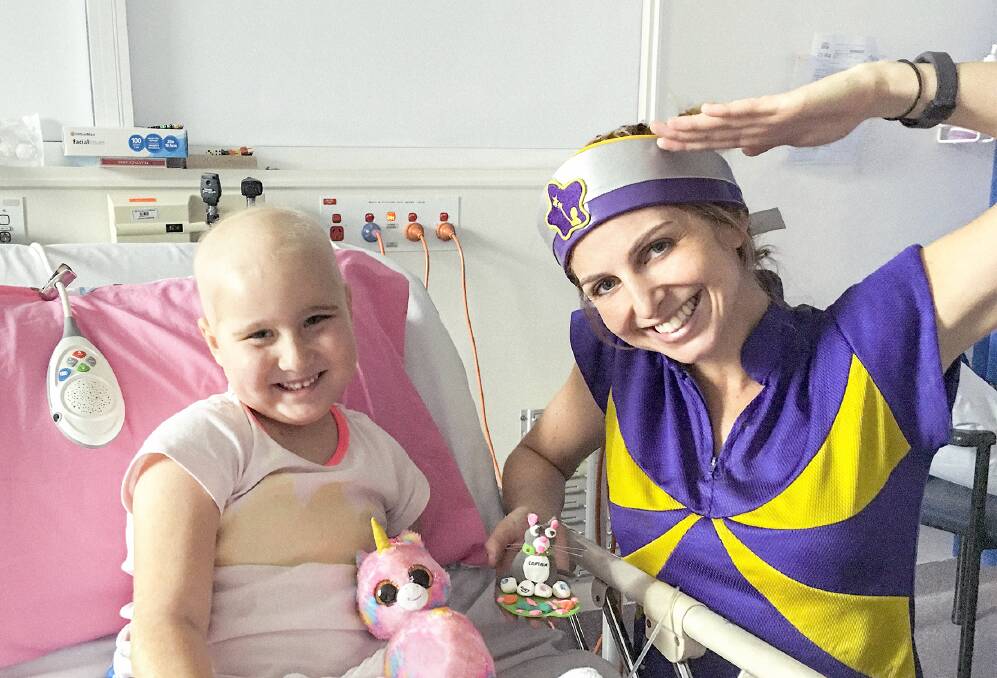 Five-year-old Ruby with Captain Starlight. Photo: supplied