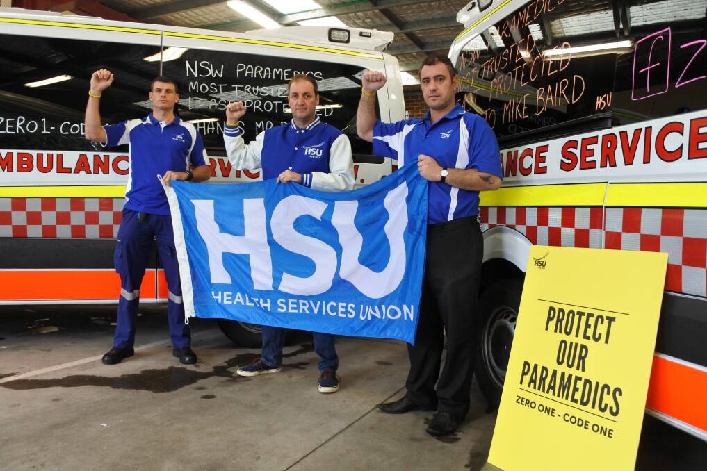 Health Services Union delegates Iain Quigg, Matt Anderson and Scott Taylor at Bowral and District Hospital ambulance station. Photo: Claire Fenwicke