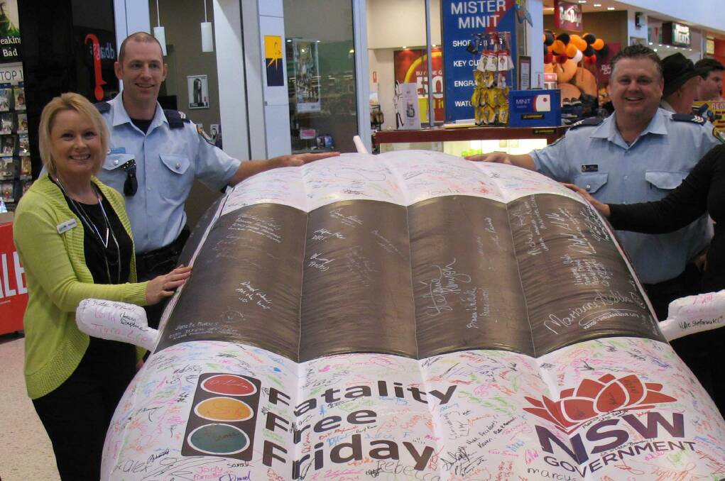 Make your promise: Come and sign the Fatality Free Friday inflatable car at Service NSW Centre at Highlands Hub in Mittagong on May 26. Photo: WSC