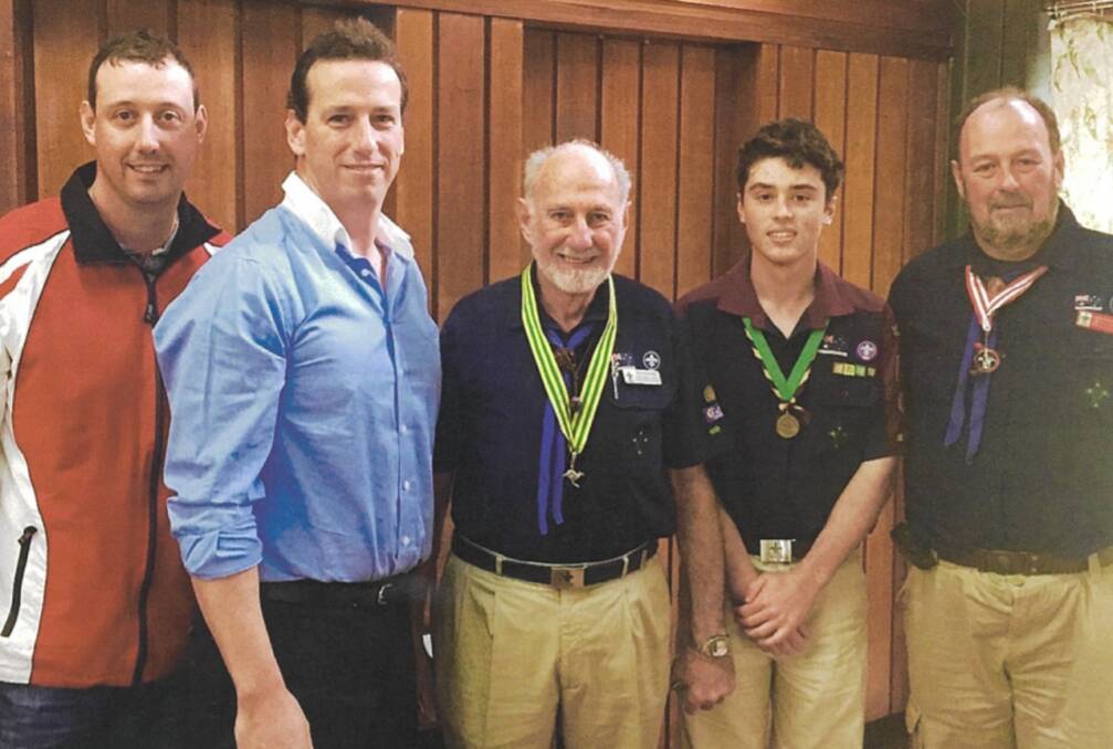 Peter Nickl (centre) with his sons Marc, Tracy and Trevor, and his grandson Phillip. Peter, Trevor and Phillip are all Queens Scouts. Photo: supplied