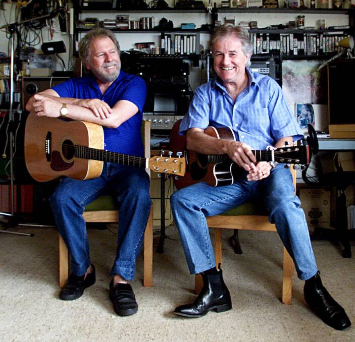 Soul behind songs: Kevin Johnson (left, pictured with Mike McLennan) will perform his music for Highlanders in Mittagong. Photo: file