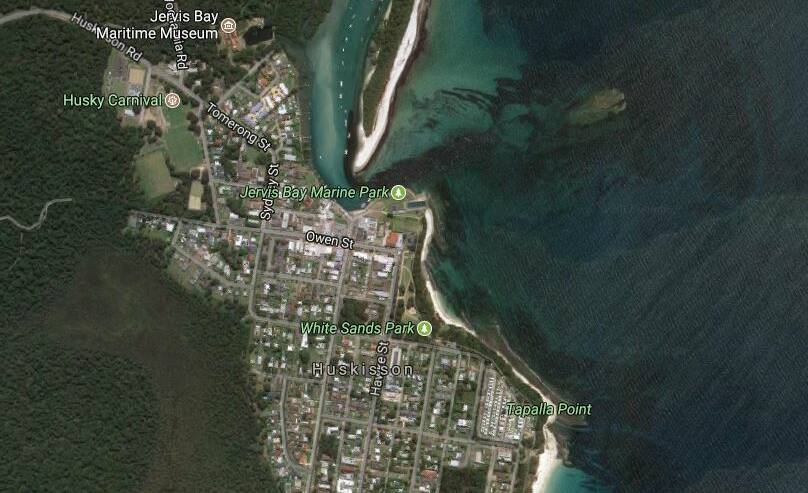 A boat capsized during the rescue of a male swimmer off Huskisson on Tuesday afternoon. Photo: Google Maps