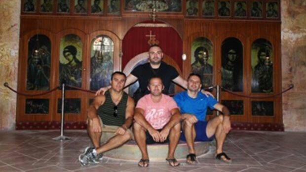 Simon Sheu, George Nika, Marsel Boka and Aniello Vinciguerra at the Serbian Orthodox Church in Coober Pedy.  Photo: Supplied